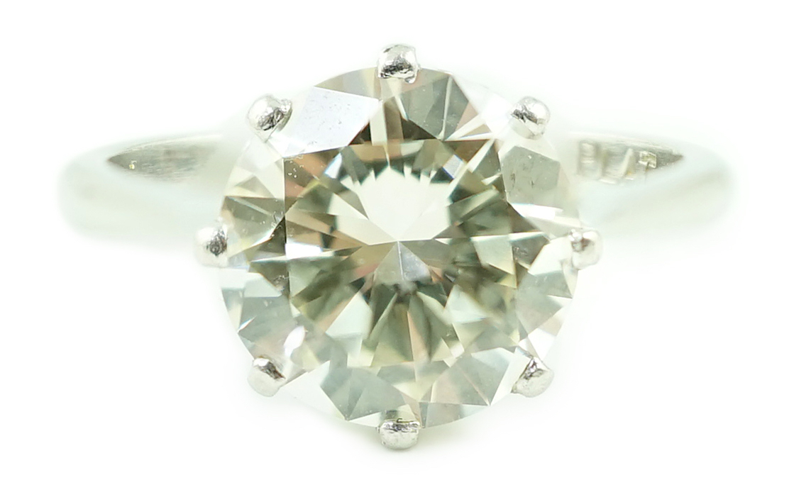 A platinum and solitaire diamond set ring